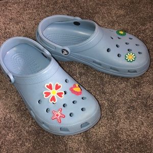 Blue crocs with charms
